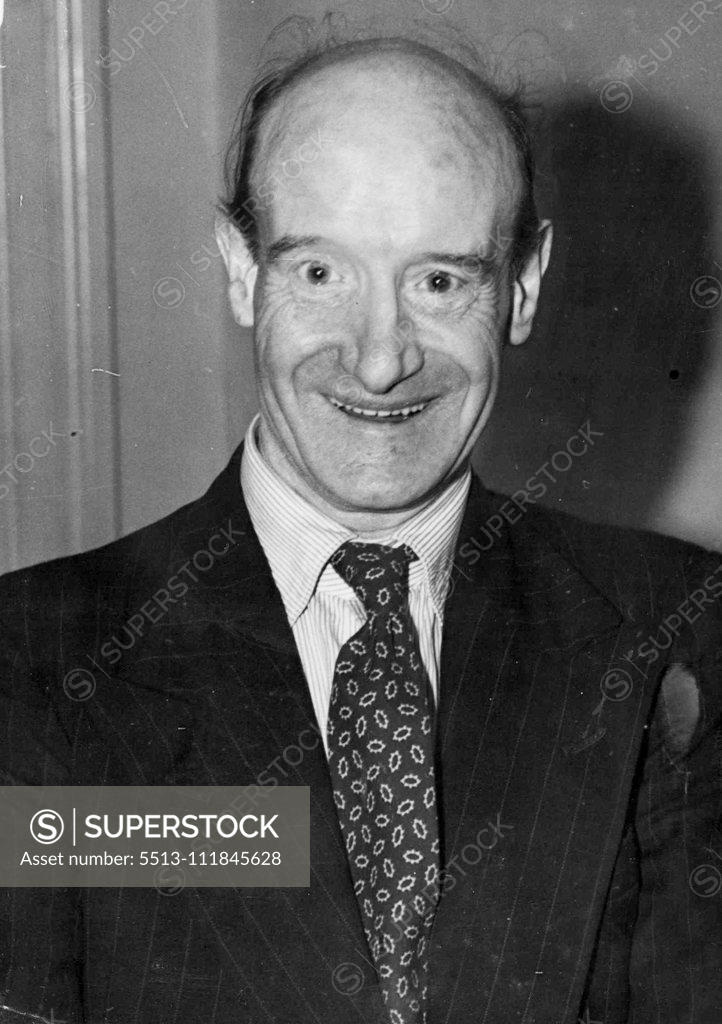 Stock Photo: 5513-111845628 ***** Grin. John Pass, 57-year-old Scot, smiled ***** won a 6d pool, but he's found riches an embarrassment. December 13, 1950. (Photo by Daily Mail Contract Picture).;***** Grin. John Pass, 57-year-old Scot, smiled ***** won a 6d pool, but he's found riches an embarrassment.