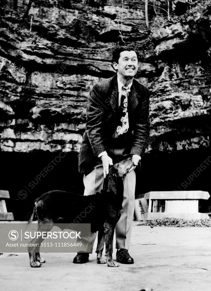 Stock Photo: 5513-111856449 Planes, have pools, big cars - Acuff and hound at Dunbar Cave, part of his prosperous mountain resort. May 08, 1952.;Planes, have pools, big cars - Acuff and hound at Dunbar Cave, part of his prosperous mountain resort.
