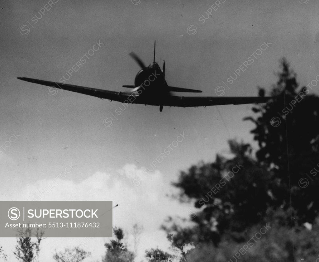 Stock Photo: 5513-111876432 Spotting planes in ***** VDC manoeuvres came within so ***** the ground clipping the trees. December 07, 1942.;Spotting planes in ***** VDC manoeuvres came within so ***** the ground clipping the trees.