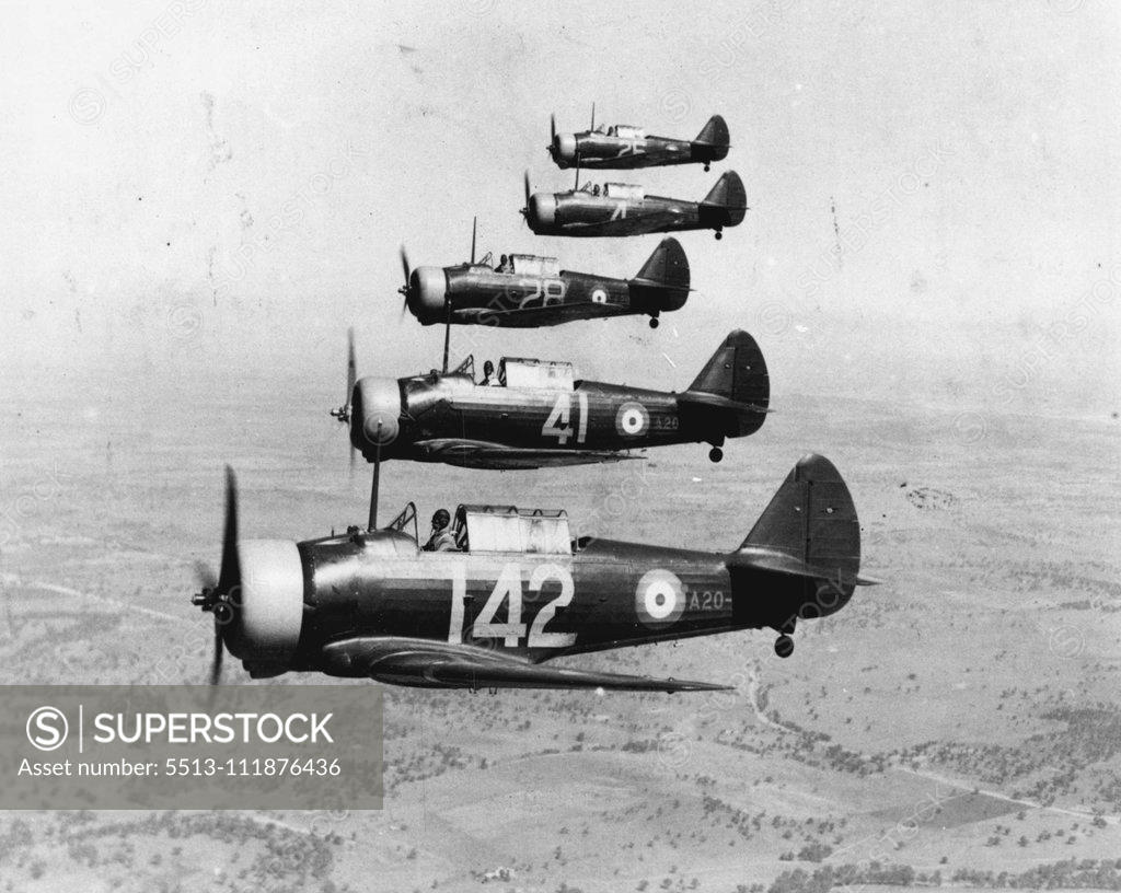 Stock Photo: 5513-111876436 Wirraways, 5 in "Echelon Right Stepped up" formation, at No. 2 Service flying Training School, Wagga Wagga (NSW). January 20, 1941. (Photo by John Harrison, Australian War Memorial).;Wirraways, 5 in "Echelon Right Stepped up" formation, at No. 2 Service flying Training School, Wagga Wagga (NSW).