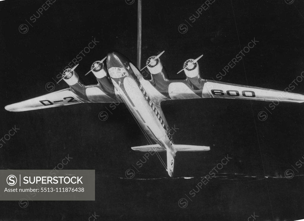 Stock Photo: 5513-111876438 Herr Hitler's New Aeroplane, Specially Built For His Personal Use -- A model of Herr Hitler's New plane, as it will look when finished. This model has been presented to the fuhrer by his pilots. Herr Hitler is having built for his personal use a huge focke-wolf "Condor" four-engined plane of the same type that made the first Berlin-New York crossing last summer. The interior will be most artistically decorated to comply with the fuhrer's ideas. It will also enable him to hold conferences in the