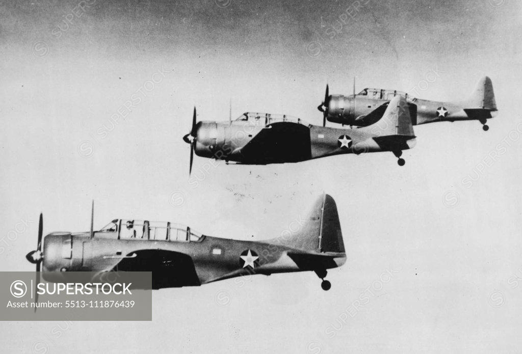 Stock Photo: 5513-111876439 Fighting The Japs By Air -- These three A-24 bombers took part in the battle of Bali, where they were engaged in a running fight with a Japanese invasion fleet and seriously damaged a Japanese cruiser. June 11, 1942.;Fighting The Japs By Air -- These three A-24 bombers took part in the battle of Bali, where they were engaged in a running fight with a Japanese invasion fleet and seriously damaged a Japanese cruiser.