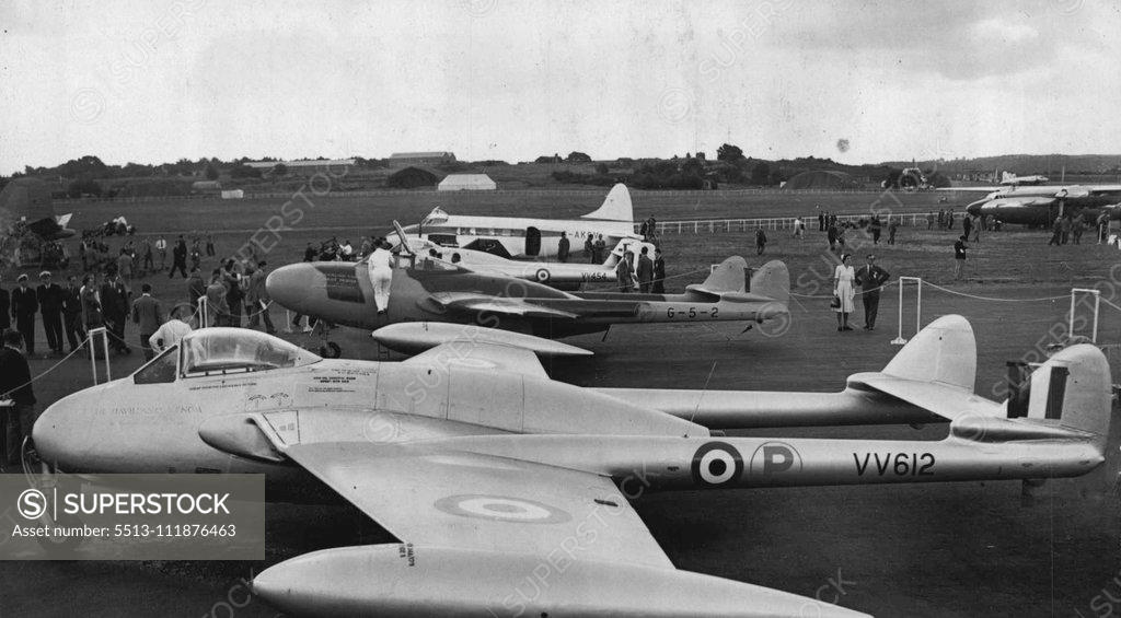 Stock Photo: 5513-111876463 Of The Secret List To-day -- Nearest the camera is the Venom high altitude day fighter. The Vampire night-fighter is seen next with a mechanic working outside the cockpit. At the preview of the Society of British Aircraft Constructors' show at Farnborough, Hants to-day were two new de Havilland jet fighters, which have just come off the secret ***** to-day in time for the show. September 6, 1949. ;Of The Secret List To-day -- Nearest the camera is the Venom high altitude day fighter. The Vampir