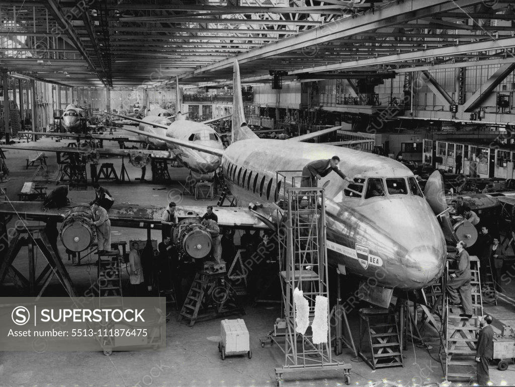 Stock Photo: 5513-111876475 Dollars On The Assembly Line -- Nose to tail on the assembly line are Viscounts - planes that mean dollars for Britain - at the Vickers Armstrong aircraft factory at Weybridge, Surrey. Fifteen Viscounts worth more than ***** million sterling (11½ million Canadian dollars) have been ordered by Traces-Canada Air Lines. The planes are scheduled for delivery between September, 1954, ***** April, 1955. The order climaxes two years of ***** between Vickers and ***** Canada. Viscount, powered by four