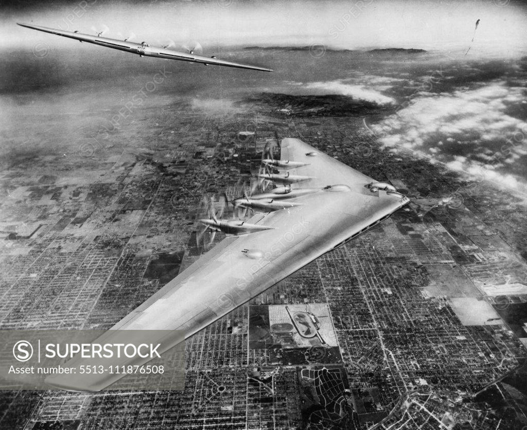 Stock Photo: 5513-111876508 Shown here is an artist's conception of the Northrop Flying Wing XB-35 in flight over Los Angeles. Top of the picture is south and directly under the Flying Wing is the famed Hollywood Park Race Track. Northrop Field, home of the Northrop Flying Wing XB-35, is approximately at the center of the picture blocked out by the view of the bomber. Front view of the big bomber at upper left illustrates how little area the big ship presents to the air in flight. May 26, 1947. ;Shown here is an artist's c