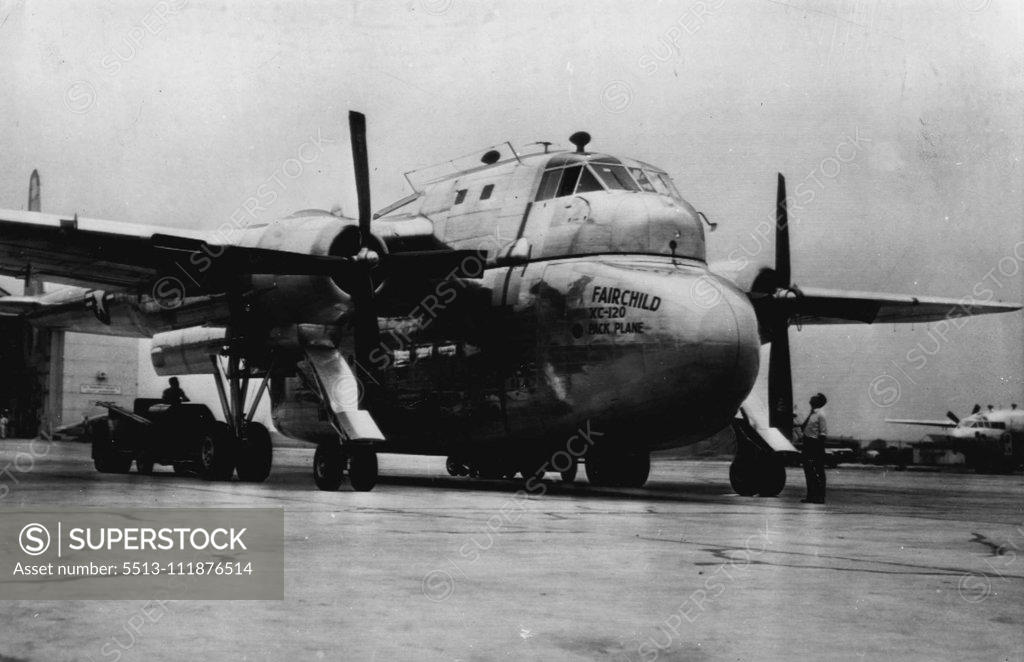 Stock Photo: 5513-111876514 'Trailer-Truck' Plane For Air Force Tests -- The Fairchild XC-120 Pack Plane, designed to leave its loaded fuselage at its destination and take off for another cargo-laden 'belly', makes its debut as a revolutionary new military transport plane. The craft has a detachable fuselage on separate wheels which can be left on the ground for later unloading. The fuselage has a 20,000 pound capacity. February 22, 1951.;'Trailer-Truck' Plane For Air Force Tests -- The Fairchild XC-120 Pack Plane, designe