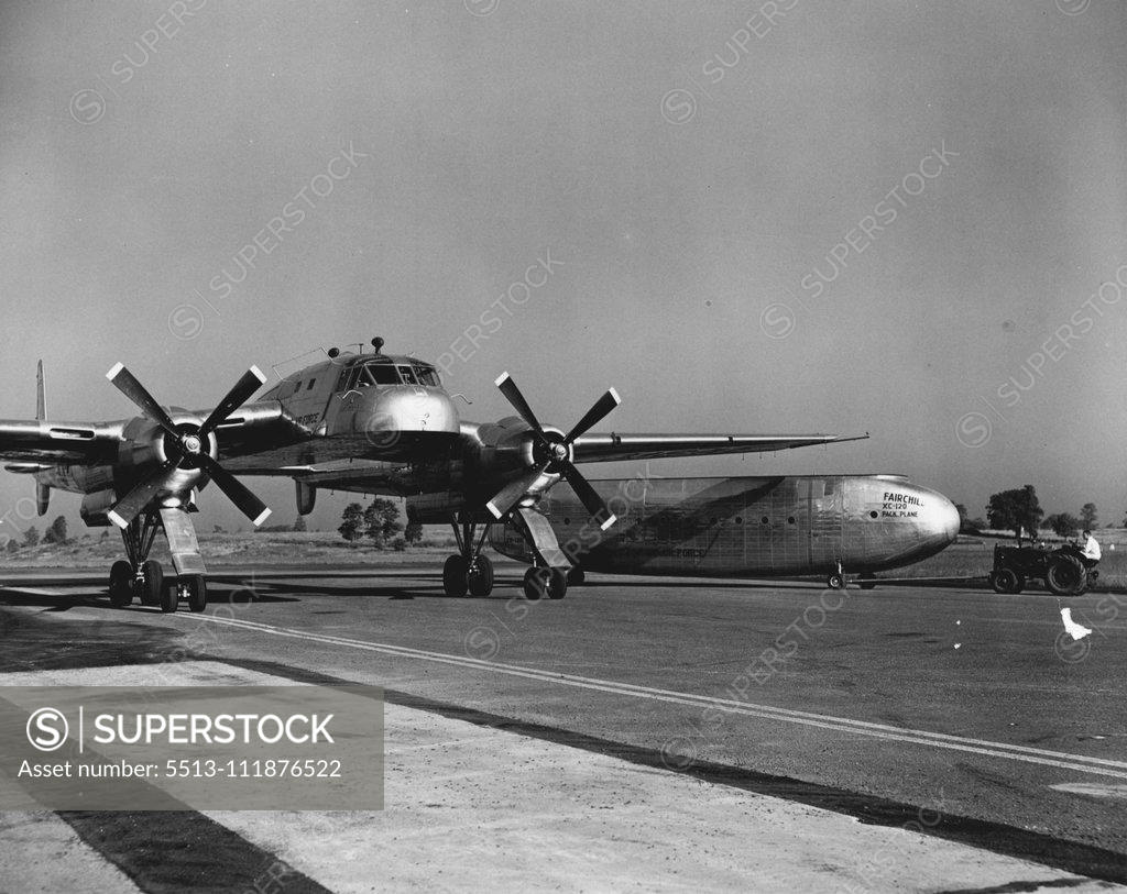 Stock Photo: 5513-111876522 The cargo-carrying fuselage of the revolutionary new Fairchild XC-120 Packplane parked alongside the plane. Detachable quickly and easily, the "pod" can be loaded or unloaded at the convenience of ground crews, freeing the plane itself to pick up another "pod". October 01, 1950. (Photo by Dan Frankforter, Fairchild Aircraft). ;The cargo-carrying fuselage of the revolutionary new Fairchild XC-120 Packplane parked alongside the plane. Detachable quickly and easily, the "pod" can be loaded or unloa