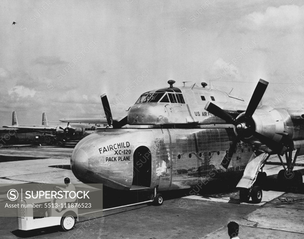 Stock Photo: 5513-111876523 A tractor towing the detachable cargo compartment from the XC-120 Packplane. A detachable-fuselage transport airplane was demonstrated recently by the United States Air Force at Hagerstown, Maryland. Known as the Fairchild XC-120 Packplane the twin-engined, high-wing monoplane carries a removable "pod" which can carry 36 litter patients, 64 fully equipped troops, or 20,000 pounds of cargo. In operation, the airplanes is designed to fly into a forward area, have its fuselage or "pod' detached in