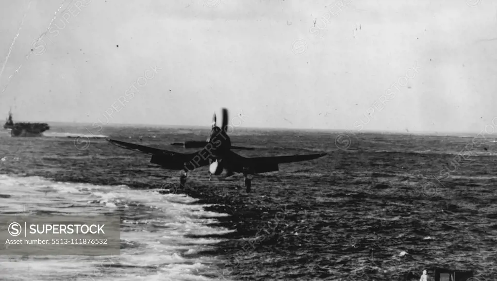 Marine Squadron On Carrier -- U.S. Marine Corps fliers have ***** to aircraft carriers for operations ***** enemy. Marine pilots flying F4U (Corsairs) and ***** command of Lieutenant Colonel William ***** are now operating from carriers in the *****. The above photos are the first pictures ***** since they began their present duty. Photo shows one of the Corsairs coming in for a landing *****. February 14, 1945. (Photo by Official U.S. Navy Photograph).;Marine Squadron On Carrier -- U.S. Marine 