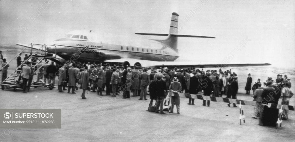 Stock Photo: 5513-111876558 New Yorkers Inspect Canadian Jet Engine -- The Avro Jetliner, Canadian-built jet airliner, attracts a crowd at international airport here today after completing a 365-mile flight from Toronto, Canada, in one hour. The 60-passenger plane resembles an ordinary plane except for its absence of propellers. There are two jet engines on each wing. The plane bore gifts and invitations on behalf of the Canadian International Trade Fair at Toronto May 29-June 9. April 18, 1950. (Photo by AP Wirephoto).;Ne