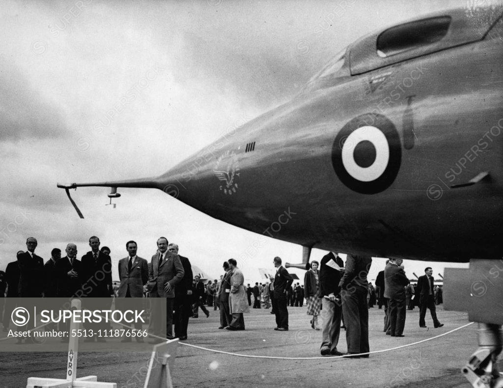 Stock Photo: 5513-111876566 The Duke Sees Britain's Latest -- H.R.H. The Duke of Edinburgh inspecting an Avro delta wing fighter at Farnborough yesterday. H.R.H. The Duke of Edinburgh flew form Balmoral, Scotland, yesterday to see the British Aircraft constructors at Farnborough Hants. Later he left by air for Belfast where he is attending the annual meeting of the British Association. (The Scientific Body). September 3, 1952. (Photo by Paul Popper). ;The Duke Sees Britain's Latest -- H.R.H. The Duke of Edinburgh inspectin