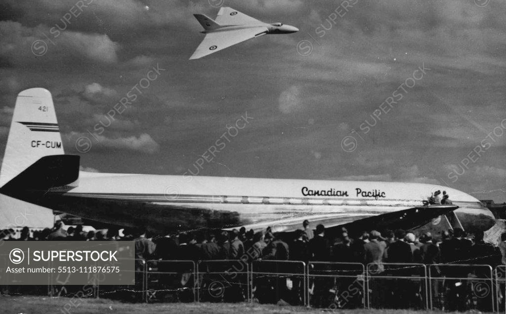 Stock Photo: 5513-111876575 Below it flies above the De Havilland Comet jet liner constructed for Canadian Pacific Airlines, the first sold outside England. September 9, 1952. ;Below it flies above the De Havilland Comet jet liner constructed for Canadian Pacific Airlines, the first sold outside England.