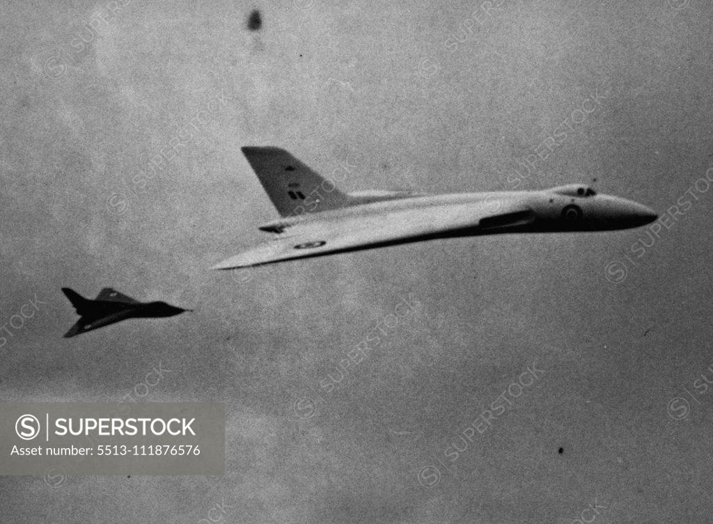 Stock Photo: 5513-111876576 "Mother" And "Son" -- The Avro 698 Delta-wing bomber and the Avro 707, from which the larger aircraft was developed, seen in flight over Farnborough today. A "Mother" and "Son" were seen flying together today at the Farnborough air display organized by the society of British Aircraft Constructors. They were the Avro 698 delta-wing bomber and the small Avro 707 from which the 698 was developed. September 4, 1952. (Photo by Paul Popper Ltd.).;"Mother" And "Son" -- The Avro 698 Delta-w