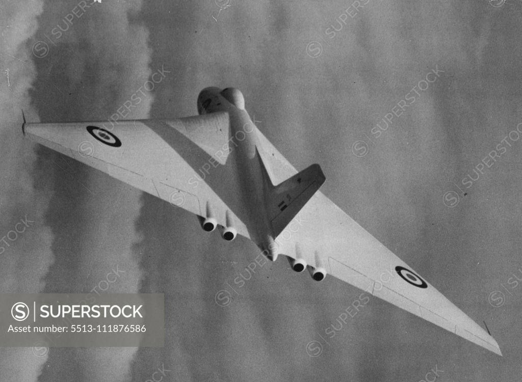 Stock Photo: 5513-111876586 Delta Bomber Flies Over Air Show -- There she goes - the Avro A698, the world's first four-jet delta-shaped flying triangle long-ranged bomber. This impressive picture was taken as the aircraft flew over the Farnborough air show to-day. The ban on faster-than-sound flying by British ace test pilots, imposed yesterday, was raised to-day but only for to-day. The Delta bomber was to have appeared at the society of British Aircraft Constructors' show here yesterday, but was prevented form doing so b
