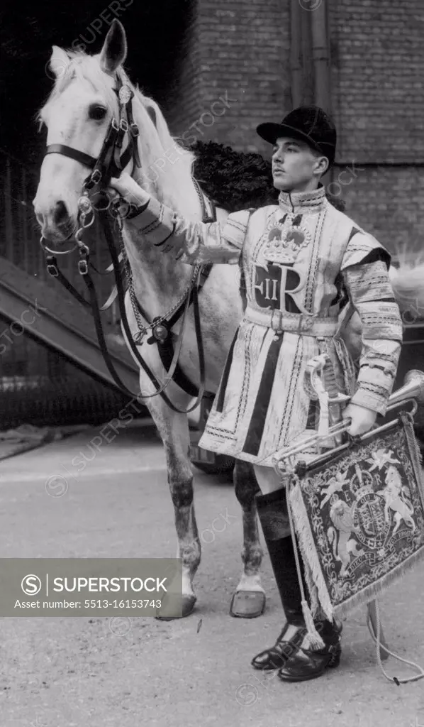 His Coronation Splendour In full ceremonial dress at knights bridge Barracks today during a rehearsal was trumpeter A.E. D'Arcy, of sidcup, one of the State Trumpeters of the Household Cavalry who will sound a fanfare at the Coronation of Queen Elizabeth. March 18, 1953. 
