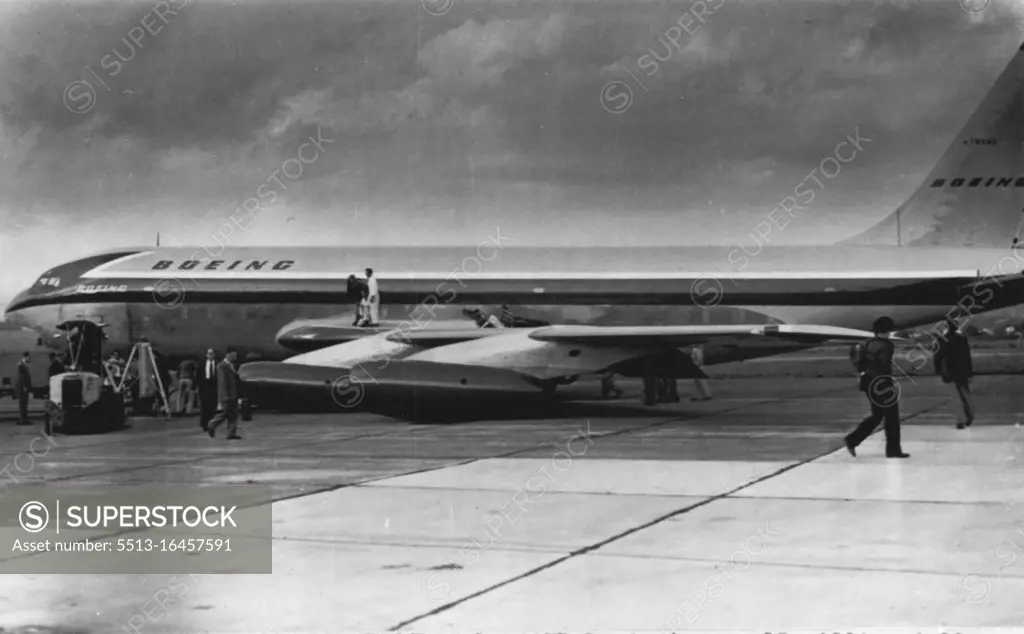 New Jetliner Damaged-Boeing's new 15-million-dollar Jet transport squats on runway after the left landing gear buckled during taxi tests late yesterday. A portion of the damaged wing flap can be seen above wing next to fuselage. The accident will delay first flight several weeks. Boeing engineers estimated. May 22, 1954. (Photo by AP Wirephoto).