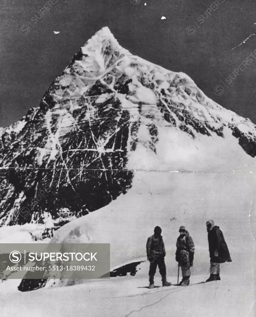 Still Unconquered and presenting its challenge to the daring,endurance and ingenuity of man Mount Everest, showing the South peak from the top of Eperon De genevous above the South Col. September 9, 1953.