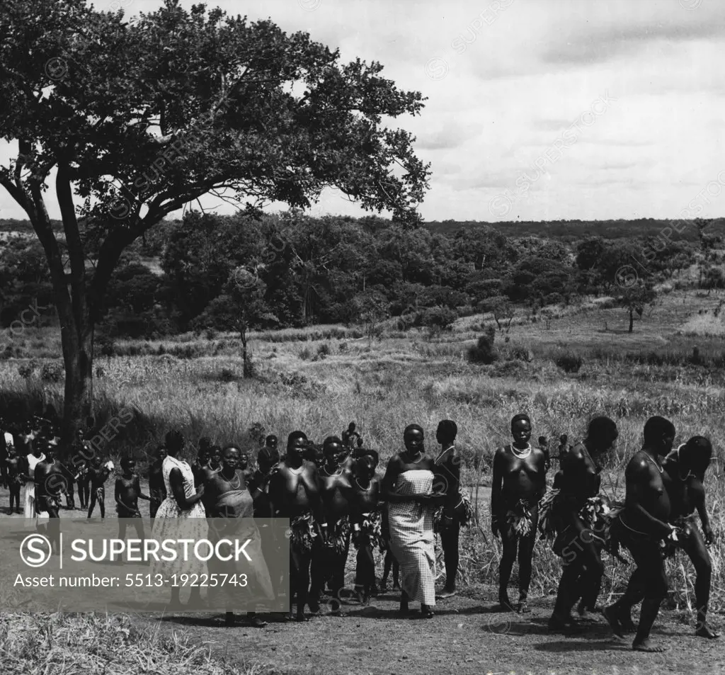 The Anglo-Egyptian Sudan.
Villagers from Poni in the Yei district arriving at local Church. This is a region in Equatorial ***** church-going is immensely popular. December 2, 1953. (Photo by George Rodger, Camera Press).