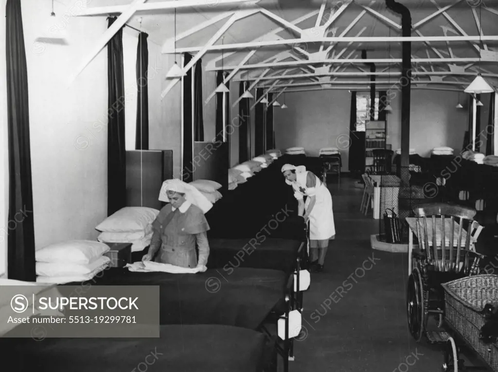 More Hut Hospitals -- A ward in one of the emergency hospital hutments near London.
No provide extra accommodation in case of air raids, construction of further blocks of hospital hutments has been started.
Hospital hutments so far completed provide 35,000 beds, which 16,500 are in districts around London. September 9, 1940. (Photo by London News Agency Photos Ltd.).
