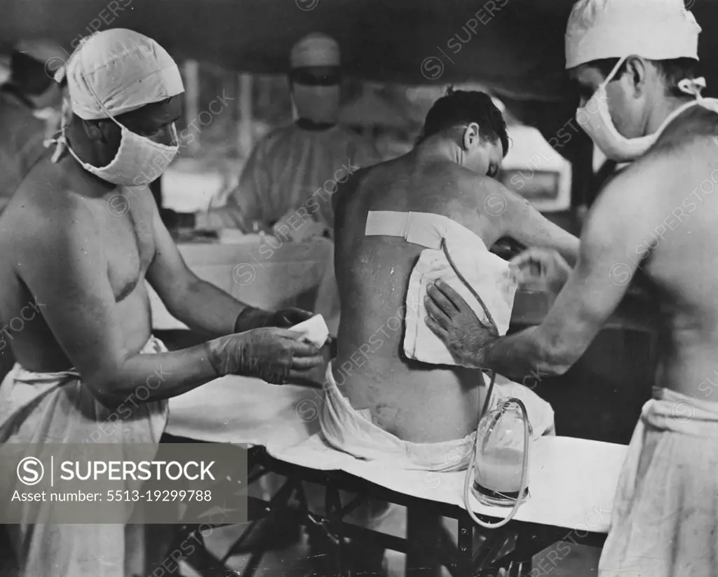 Hospitals & Operations - War File. February 14, 1944. (Photo by Official U.S. Navy Photograph).