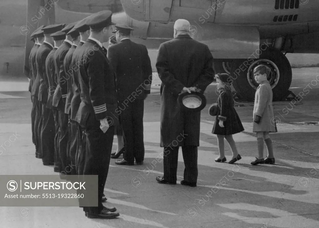 The Princess Is Home -- Little Princess Anne is tip-toe with excitement and Prince Charles is obviously admiring the uniforms of the pilots as H.R.H. Princess Margaret shakes hands with the crew of the Stratocruiser Canopus after landing at London Airport today.
H.R.H. Princess Margaret today arrived home after her Caribbean Tour. The Royal Children went with H.M. The Queen H.R.H. The Duke of Edinburgh and the Queen Mother to great the Princess at London Airport. March 03, 1955. (Photo by Fox Photos).