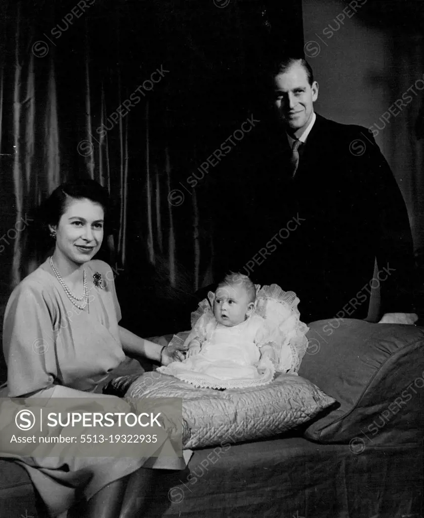 T.R.H. Princess Elizabeth And The Duke of Edinburgh With Prince Charles.Taken by Royal Command, photograph shows Princess Elizabeth and the Duke of Edinburgh with Prince Charles at Buckingham Palace. This is the first picture of the family together. May 5, 1949. (Photo by Baron, Baron Photo Centre Ltd.).