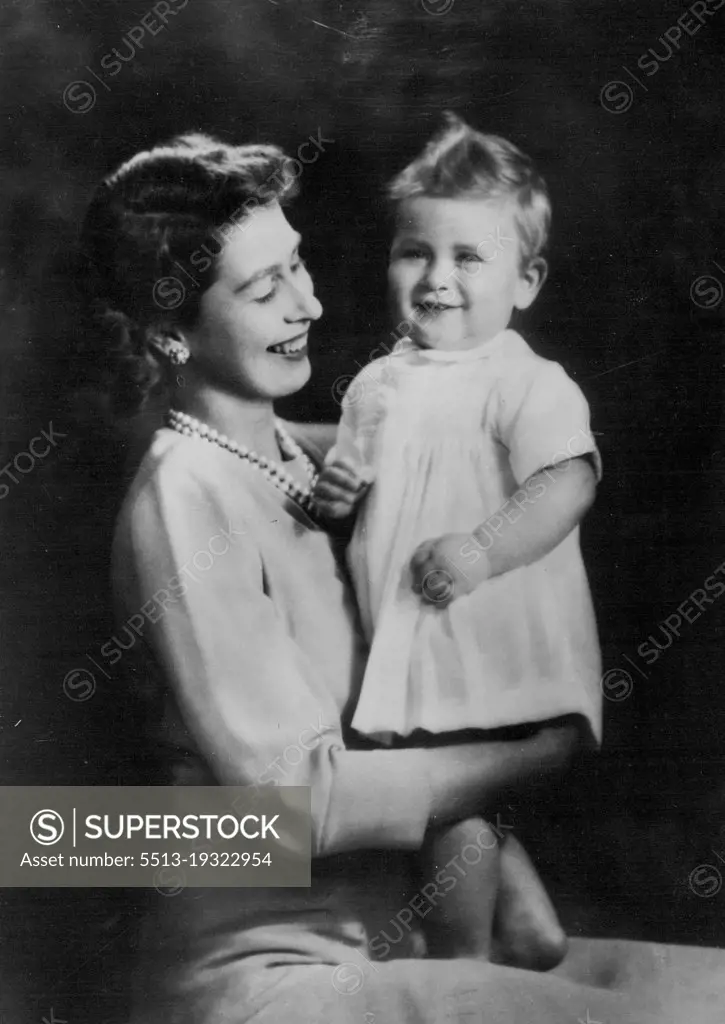 First-Birthday Portrait of Prince Charles With His Mother :A charming first-birthday portrait, by Marcus Adam, of the baby Prince Charles with his mother Princess Elizabeth.The young Prince - who now weighs over 24 pounds, and who is talk for his age - celebrates his birthday on November 14th. November 12, 1949.