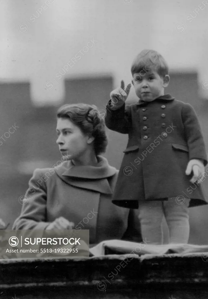 Prince Charles - With Mother - Watches Queen Juliana Drive To Guildhall :Princess Elizabeth holds her two-year-old son, Prince Charles, as they watch the procession from a wall at Clarence House.Queen Juliana and Prince Bernhard of the Netherlands, accompanied by a Sovereign's Escort of the Household Cavalry, were to-day driven from Buckingham Palace to Guildhall, where an address was presented by the Lord Mayor, Alderman Denys Lowson, and the Corporation of the City of London.At the Guildhall the Duke and Duchess of Gloucester met the Royal visitors, who were entertained by the Lord Mayor and Corporation at luncheon. November 22, 1950.