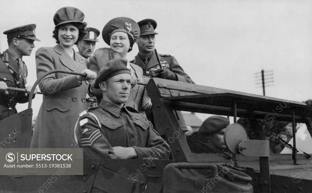 Princess Elizabeth Makes Her First Full-Length Tour Of Inspection -- The Royal Party in a scout car during their inspection of Royal Artillery.
On a recent inspection of troops the King was accompanied by the Queen and Princess Elizabeth, it was the first time the Princess had made a Full-length tour with her parents. Scottish troops and armoured infantry were among those visited.
The King and Queen and the Princess rode in jeeps their majestics were interested in new developments in the battle organisation of the Royal Army Medical Corps. April 01, 1944. (Photo by British Official Photograph).