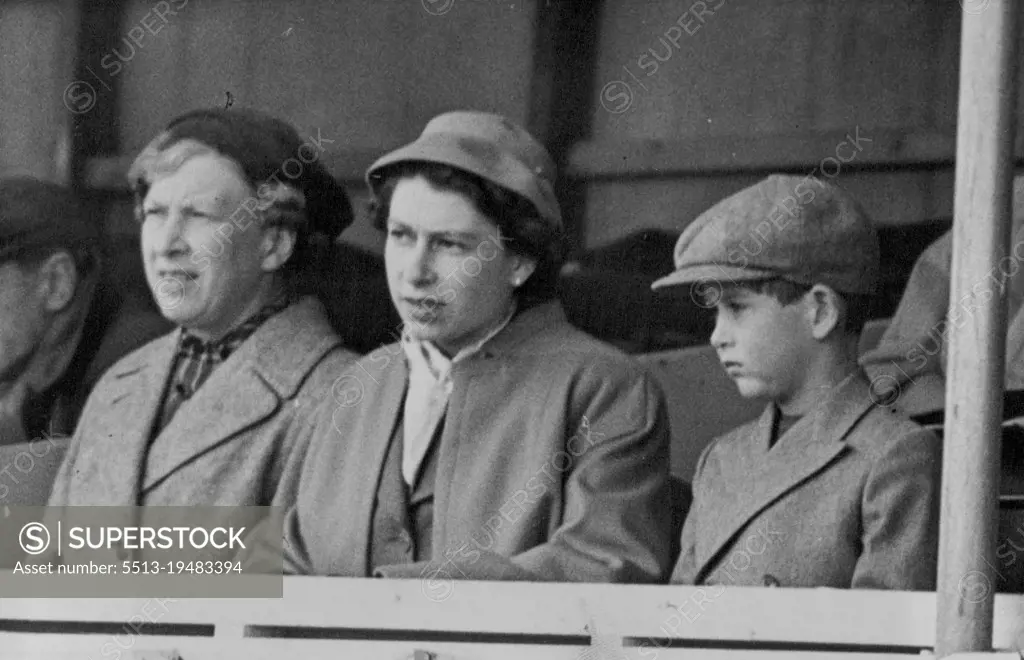 Royal Visitors To The European Horse Trials -- L to R: The Princess Royal; H.M. Queen Elizabeth; and Prince Charles watching the Dressage tests on the 1st day. Many of the world's finest horses and riders - men and women - can be seen in action at the Four day European Horse Trials opened in Windsor Great Park. May 19, 1955. (Photo by Sport & General Press Agency, Limited).