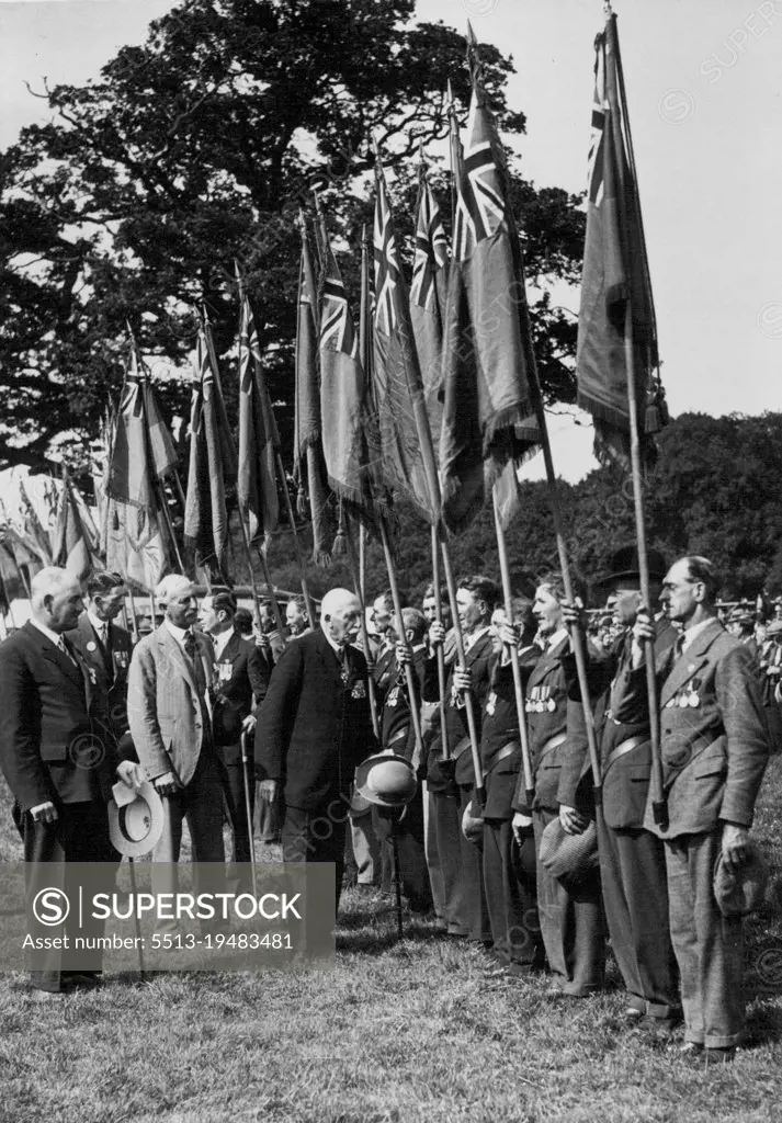 Legion Rally: Royal Inspection. -- The Duke of Connaugh inspecting standard bearers when he attended the British Legion's Guildford rally. (Photo by Central News). August 01, 1932. (Photo by Central News)