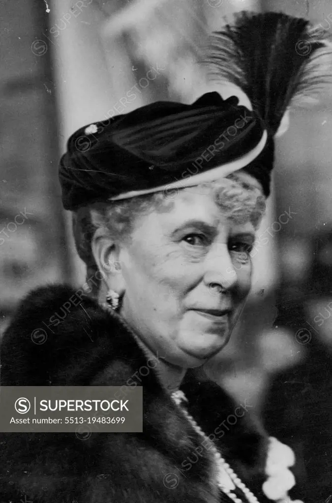 Queen Mary Attended Sale At ***** Hall -- Queen Mary leaving Kensington town hall after her visit this afternoon. Queen Mary this afternoon attended an exhibition and sale of handicrafts at the Kensington Town Hall ***** aid of the Metropolitan *****. March 23, 1938. (Photo by Keystone).