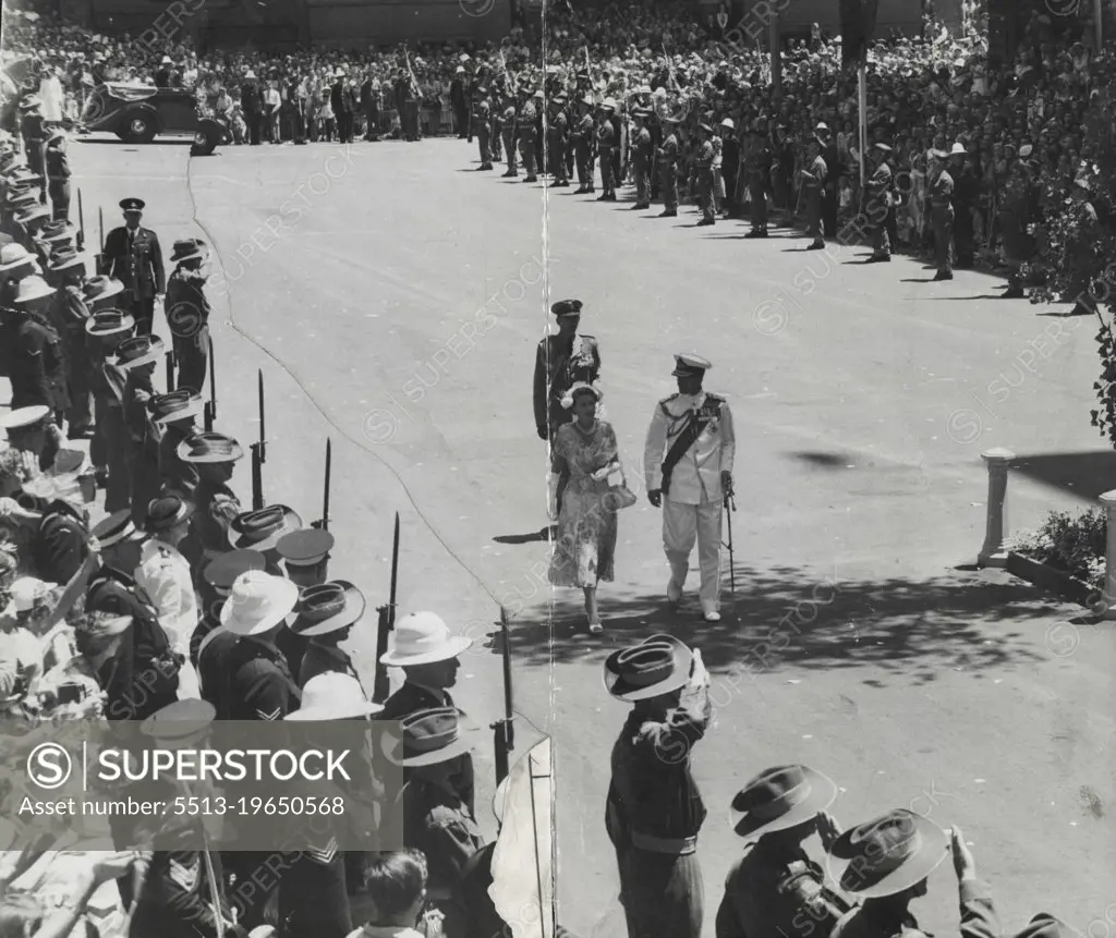 Lest We Forget - The fervent cheering of the crowd dies away as the Queen and the Duke of Edinburgh walk down Martin Place toward the Cenotaph. February 3, 1954.