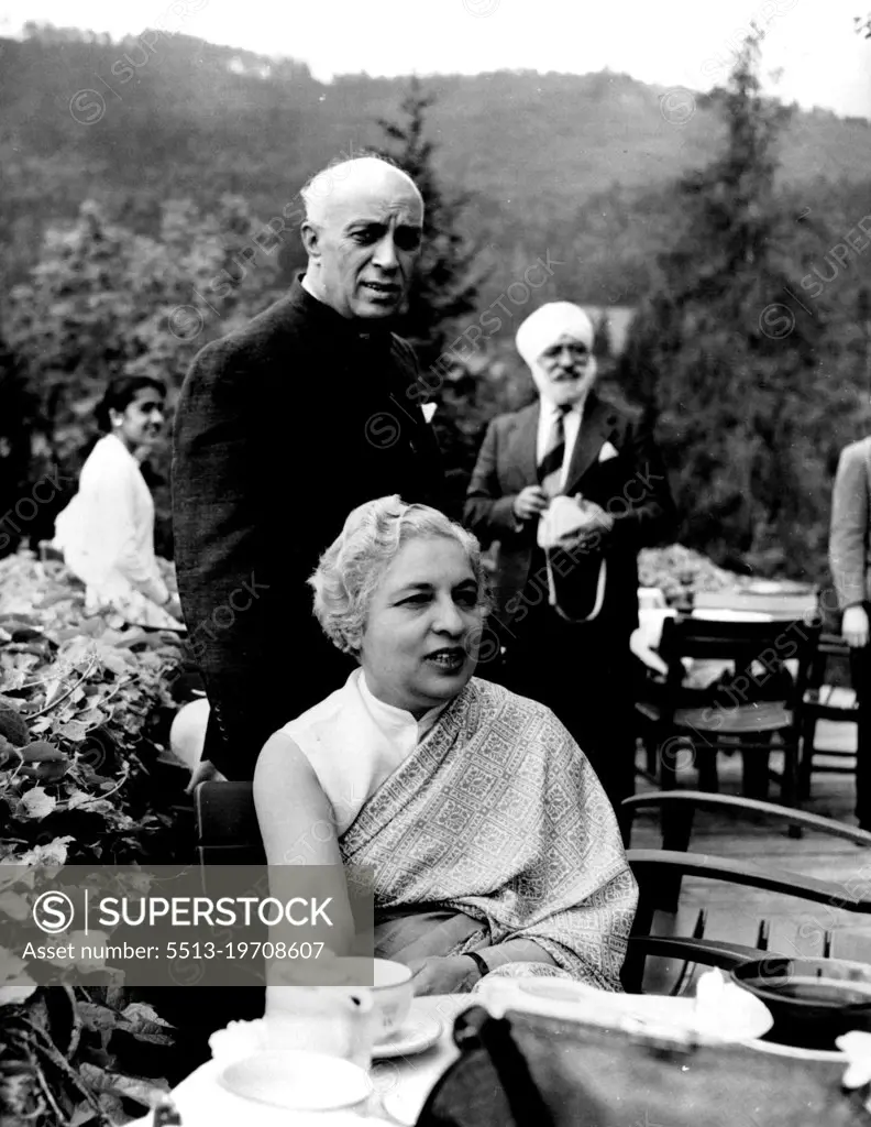 Jawarlal Nehru and His Sister Mrs. R.S. Pandit.
The Indian Prime Minister is seen with his sister, who is Indian High Commissioner in London. The photograph was taken in Austria where Mr.Nehru held a conference on India's foreign policy which was attended by his Ambassador to Europe. July 27, 1955. (Photo by Camera Press).