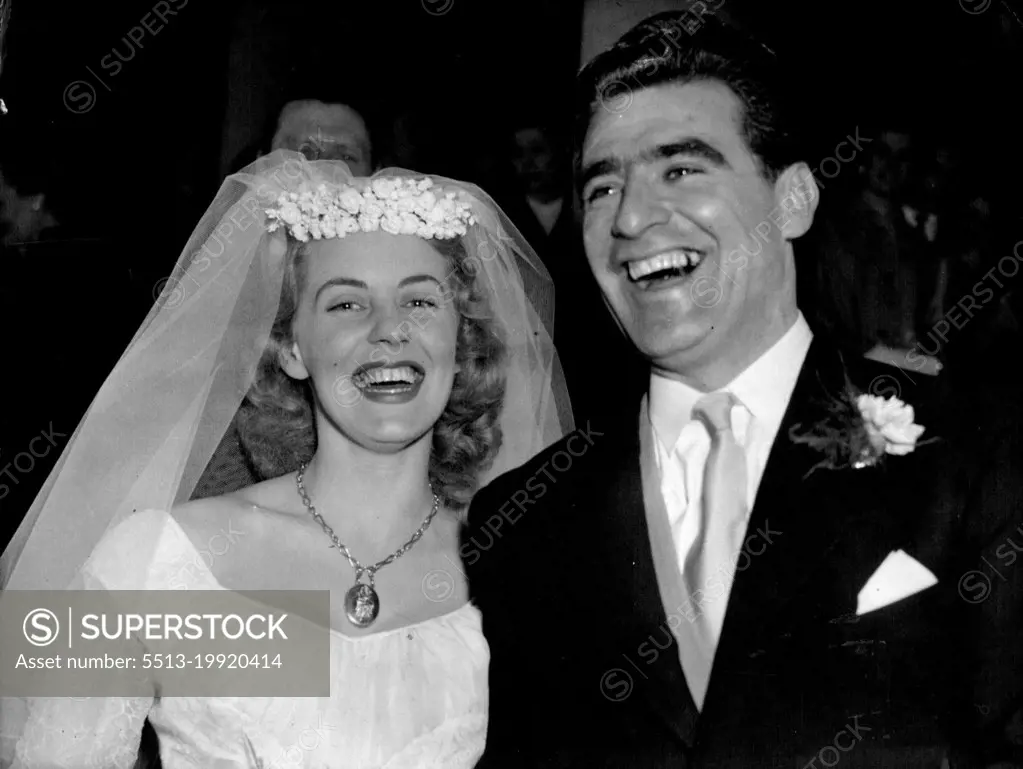 Champion Cyclist Weds:
World Champion Sprint Cyclist Sidney Patterson, of Sydney, Australia, seen with his bride, the former Miss Jo-Ellen Ann Davis after their Easter Sunday wedding at St. Mary-Le-Strand, London. April 10, 1955. (Photo by Associated Press Photo).