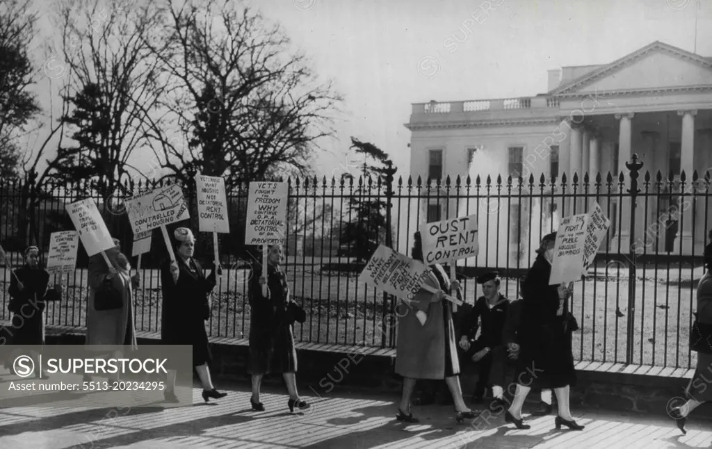Detroit Landladies Picket White House -- Seven landladies from Detroit carry placards along Pennsylvania avenue in front of the White House today, in their right against rent controls. Some of their signs read: "Oust rent control" and "Veterans want housing, not dictatorial rent control. " November 19, 1946. (Photo by AP Wirephoto).