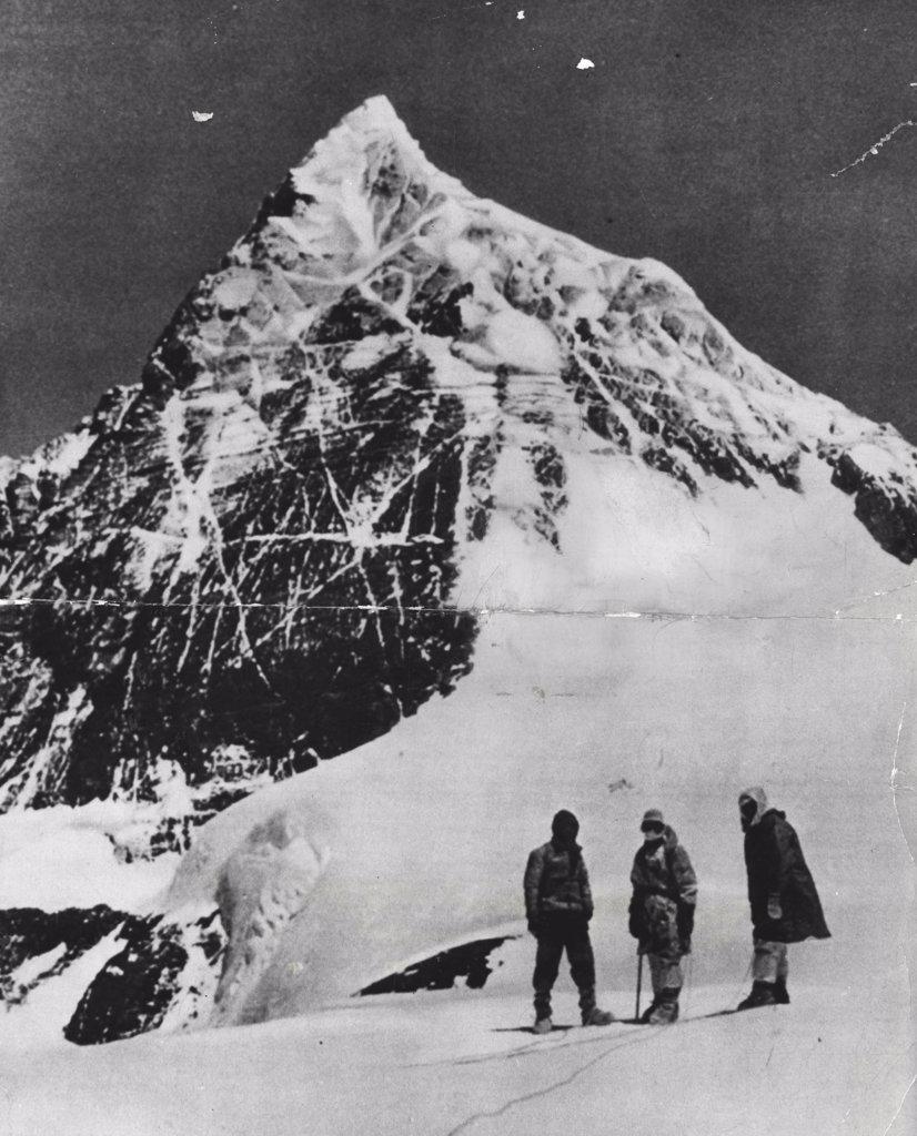 Still Unconquered and presenting its challenge to the daring,endurance and ingenuity of man Mount Everest, showing the South peak from the top of Eperon De genevous above the South Col. September 9, 1953.