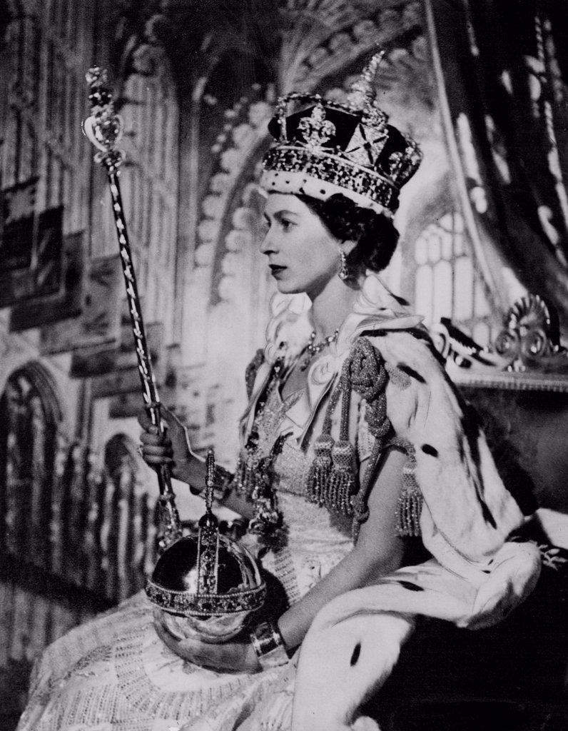 The Queen At Her Coronation New Picture -- London just released is this Cecil Beaton picture of Queen Elizabeth II, wearing the Imperial State Crown and holding the Orb, and Sceptre after her Coronation in Westminster Abbey. June 05, 1953. (Photo by United Press Photo).