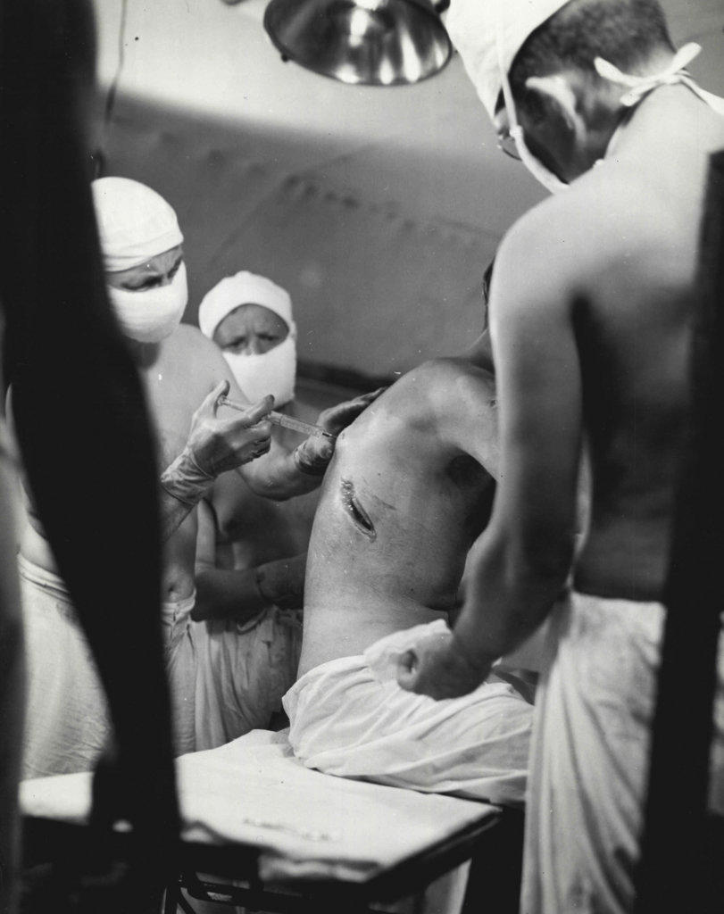 Medical Series: Giving local anesthetic. January 12, 1944. (Photo by Official U.S. Navy Photograph).