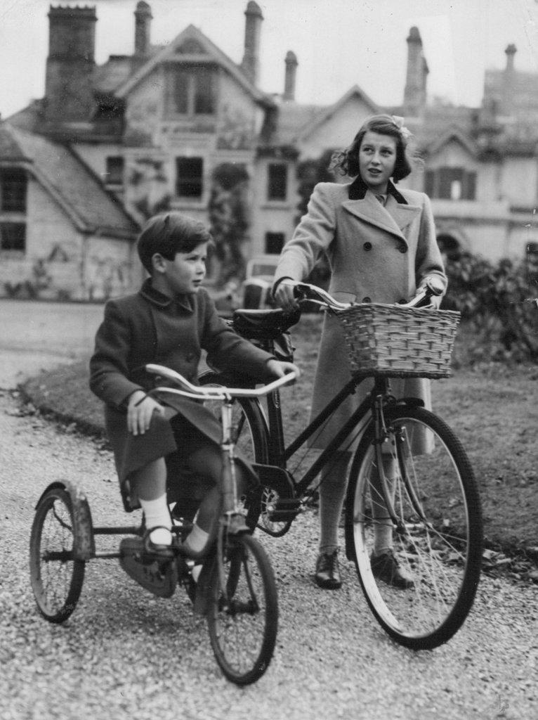 Duchess Of Kent's Children At Home. 
Princess Alexandra Will Be A Bridesmaid and Prince Michael A Page - At Royal Wedding -- Princess Alexandra (right) photographed with Prince Michael in the grounds of "Coppins" with their cycles at Ivor Buckingham shire.
Two of three children of the Duchess of Kent were photographed at their home at "Coppins" at Iver, Buckinghamshire. Princess Alexandra is to be one of the brides maids, and Prince Michael an attendant page, at the forthcoming marriage of Princess Elizabeth to Lieutenant Philip Mountbatten which takes place at Westminster Abbey, London, on 20th November. October 31, 1947.