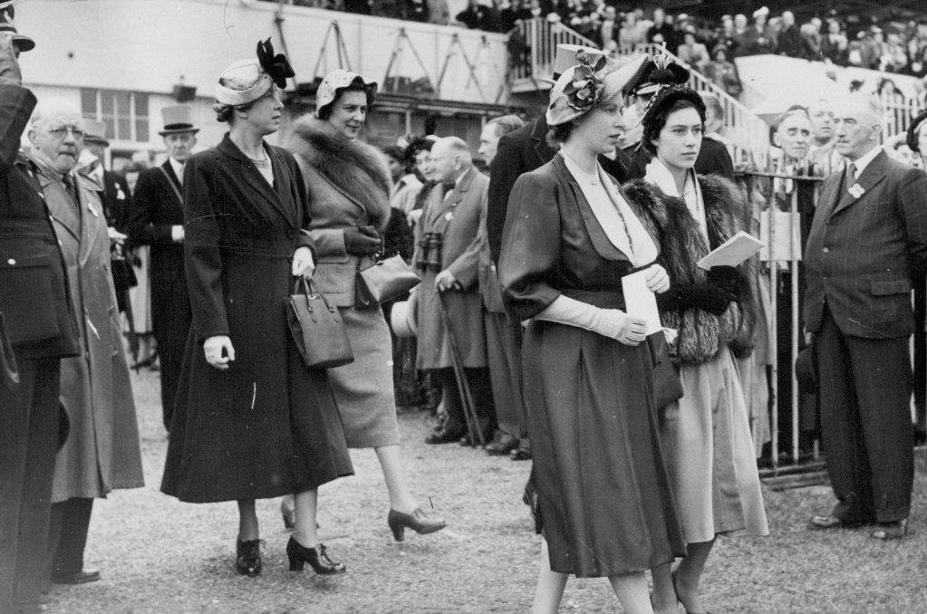 France Wins The Derby -- T.R.H. Princess Elizabeth and Princess Margaret (right) and the Duchess of Kent and Princess Royal arriving on the course. "Galcador" owned by M. Soussac and ridden by R. Johnstone won the English Derby at Epson. "Prince Simon" , the favourite, was second and "Double Eclipse" - and outsider at 40 to 1 was third. May 27, 1950. (Photo by Sport & General Press Agency, Limited).