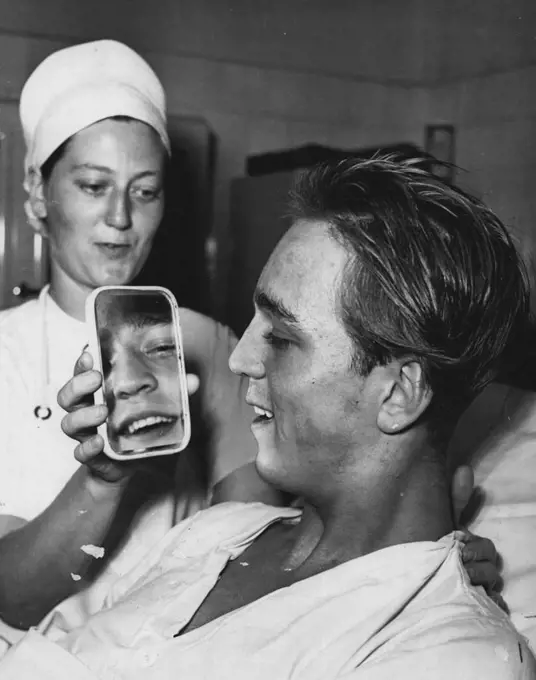 The New Nose -- Less than a minute after operation began, patient sit up, smiles at nurse, is pleased with new nose. February 26, 1955. 