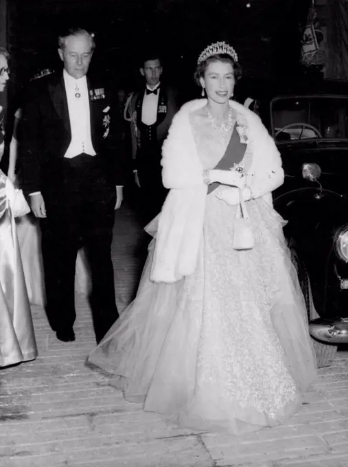 The Queen Attends State Ball in Malta. The Queen arrives, splendid in her shimmering pale blue gown, for the Governor's ball at Valletta. May 6, 1954. (Photo by Paul Popper Ltd.).