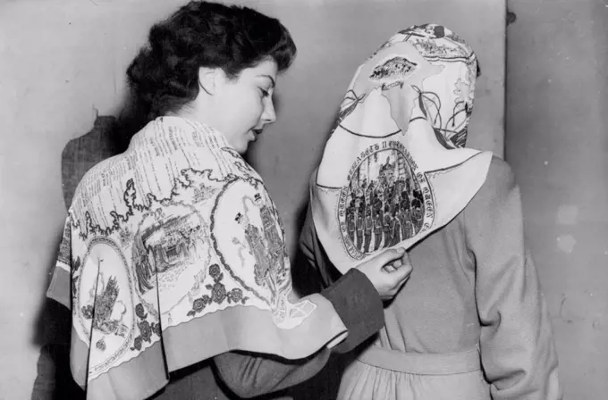 Coronation Fashion For Britain. Two of the beautiful soarbes - among the many new fashions designed specially for Coronation year in Britain. On left is shown scenes and places famous in English history arid the genealogical tree of the Royal Houses since William the Conqueror: On right scenes from the Dominions and also from the last Coronation ceremony. November 7, 1952. (Photo by Sport & General Press Agency, Limited).