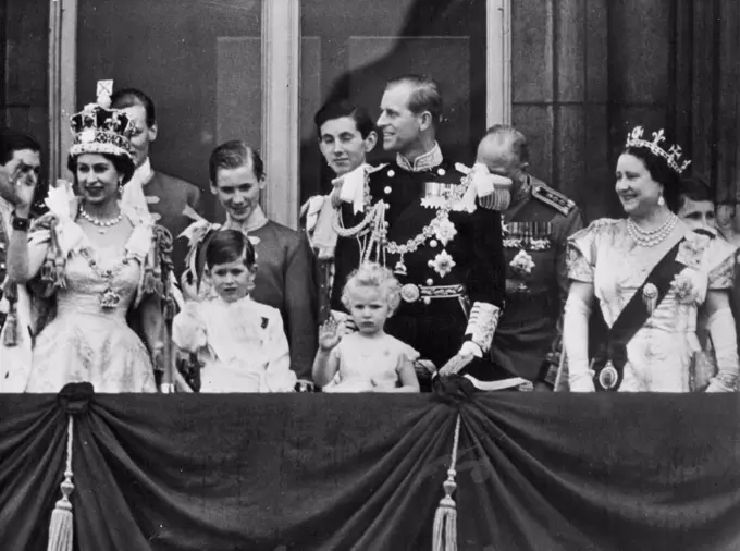 Her Majesty Greets Her Subjects -- To the hundreds of thousands of her subjects and many foreign visitors, her majesty, waves a friendly greeting from the palace balcony this evening.....With the queen can be seen the Queen mother... The duke of Edinburgh...Princess Margaret.. The duke of Gloucester...Prince Charles, and princess Anne. Same place, a different time.. a flashback to 1953 when the Royal family stood on that same balcony after the Coronation. June 02, 1953. (Photo by Paul Popper)