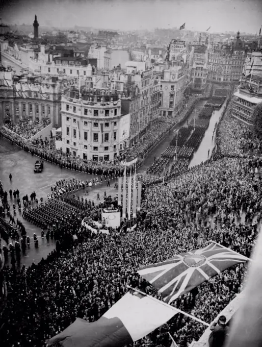 The Coronation Procession -- General view of the huge crowds in Trafalgar Square watching Commonwealth troops in the Coronation procession on its way back from Westminster Abbey to Buckingham Palace this afternoon June 2. January 06, 1954. (Photo by The Associated Press Ltd.).