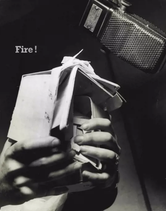 Radio Sound Effects. WIP broadcasters in Philadelphia have devised ingenious sound effects to accompany programs. Here the destruction of a 30 story building is simulated by ten fingers and 3 strawberry boxes. January 21, 1955. (Photo by PIX Publishing Inc.). 