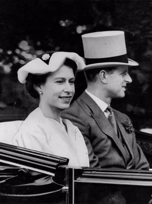 Royal Ascot - Second Day -- A close-up of the Queen and the Duke of Edinburgh driving up the course on arrival at Ascot today. June 16, 1954. 