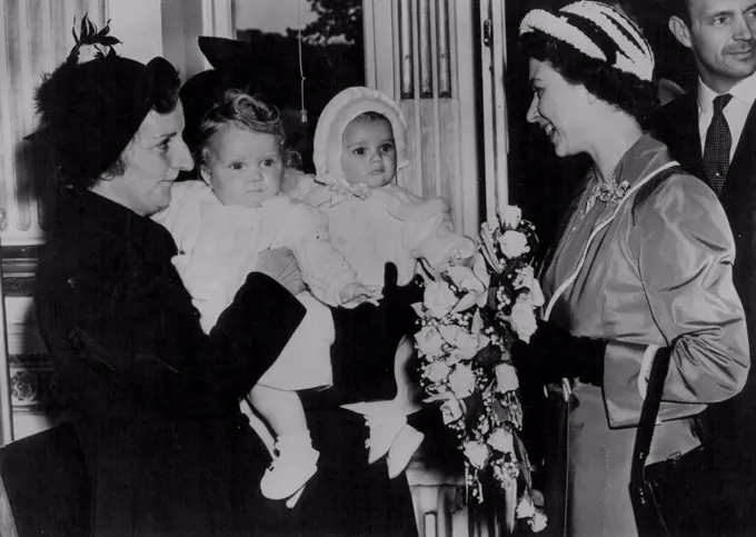 Princess Meets Two Babies Born Same Day as Princess Anne - Worthing: Smiling Princess Elizabeth is introduced to Mrs. Green and her baby Diana Mary, and Mrs. J.Harris and her daughter Mary Joyce, when she visited Courtland Hospital, Worthing, during her tour of the south coast. The two babies were both born on the same day as Princess Anne, youngest child of the same day as Princess Anne, youngest child of the Princess and the Duke of Edinburgh. May 19, 1951.