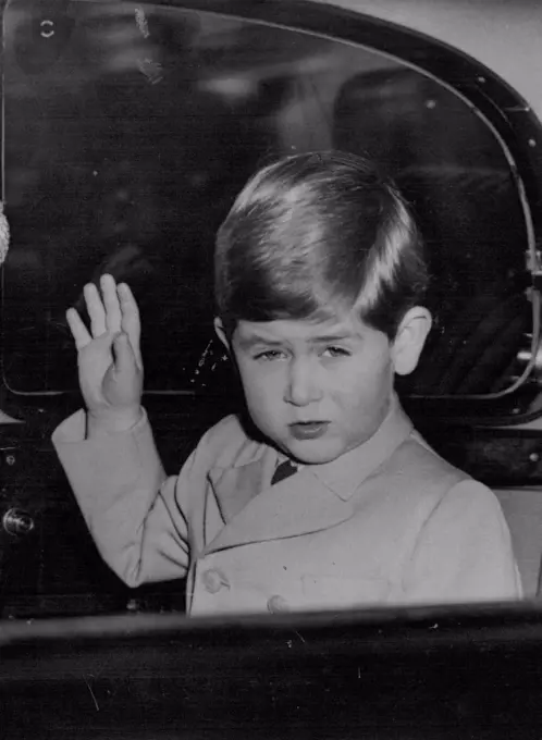 Good Bye : Prince Charles - four years old today November 14 - waves goodbye to Queen Mary, his great-grandmother, as he leaves Marlborough House, London, on his way back to Buckingham Palace at the end of a visit this afternoon. November 27, 1952.